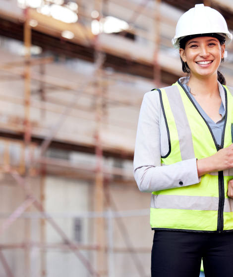 Portrait,,engineer,and,woman,with,construction,,business,and,smile,with